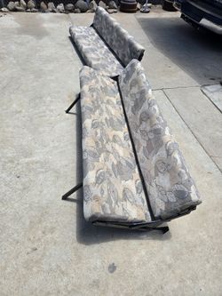 Toy hauler trailer folding bench seats
