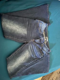 size 7 dark wash low rise flare jeans
