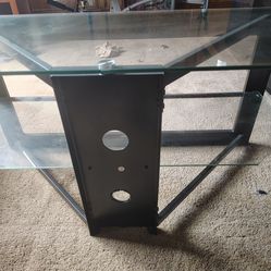 Tv floor stand or corner table.
