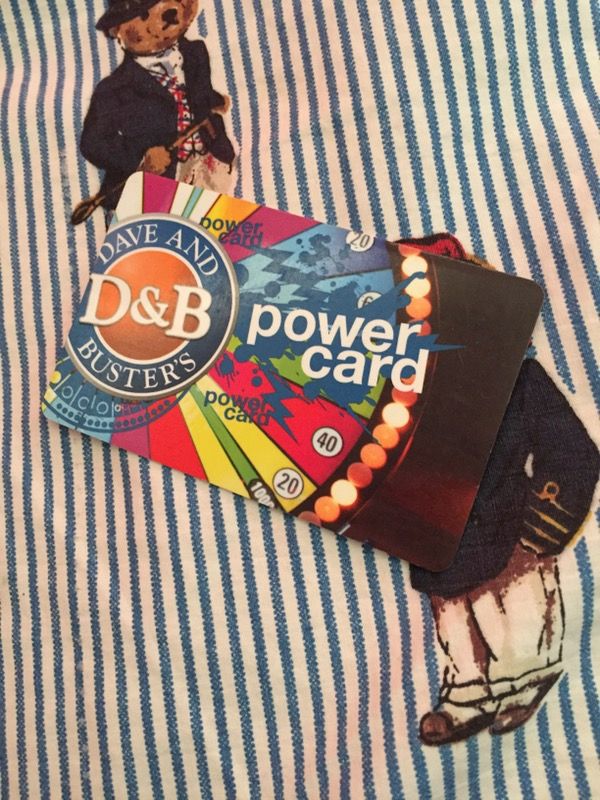 Dave and busters card with lots of tickets