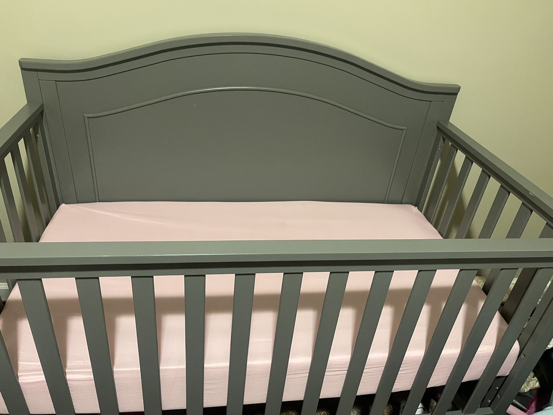 Gray baby crib