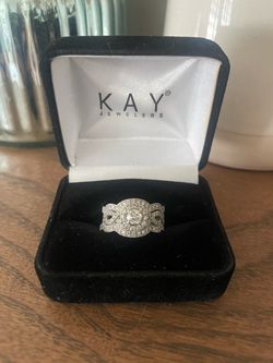 Engagement Ring with Two Wedding Bands - 14k White Gold, 1/2 carat diamond in center and 1.75 carats of diamonds overall across all 3 rings  $1,500 OB