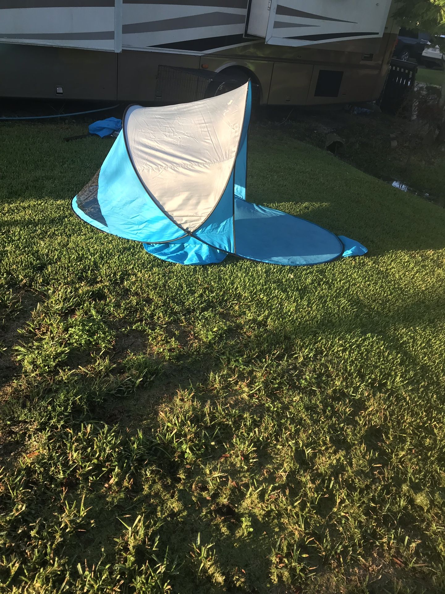 IKEA pop up wind and rain shelter, perfect for windy days at the beach. $40. Obo