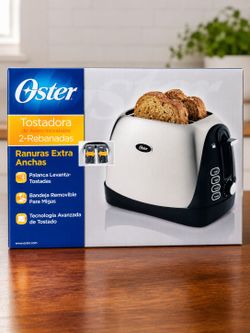 New in box Oster toaster oven