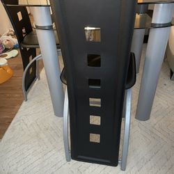 Set Of 4chairs And A double Glass Dinning Table 