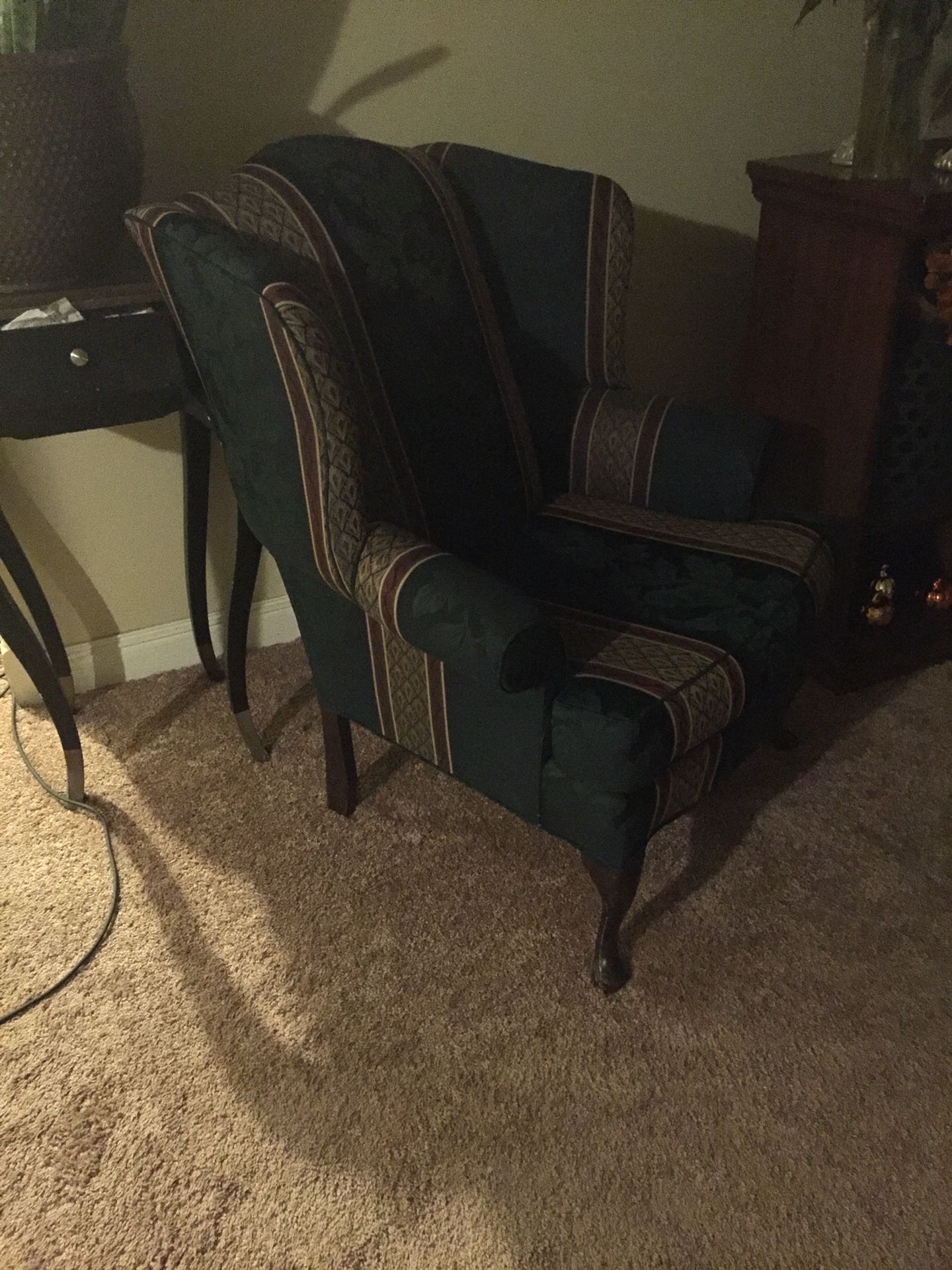2 wing back chairs for sale with Brown cover to keep clean