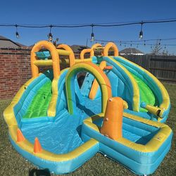 🌊 For Sale: Double Water Slide Bounce House with climbing wall