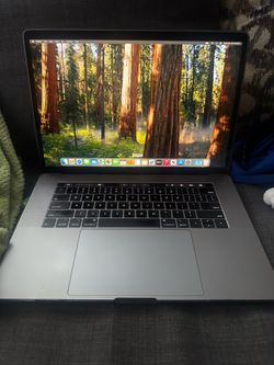 MacBook Pro 15” with Touch Bar