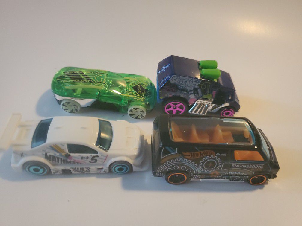 4 Small Toy Cars
