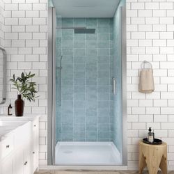 34 to 35-1/2 in. H Pivot Swing Frameless Shower Door in Brushed Nickel with Clear Glass