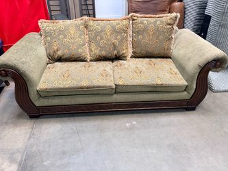 Green upholdered Cocuhes