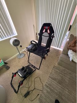 Used Next level Racing chair and Logitech G29 wheel and peddles