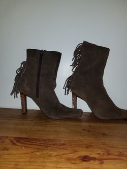 Women's faux leather boots with tassels on back