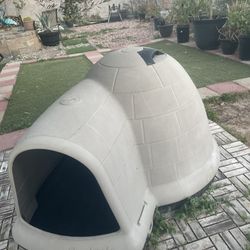 Large beige doghouse