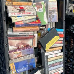 25$ A plastic crate full of either records or cassette tapes Spanish music country