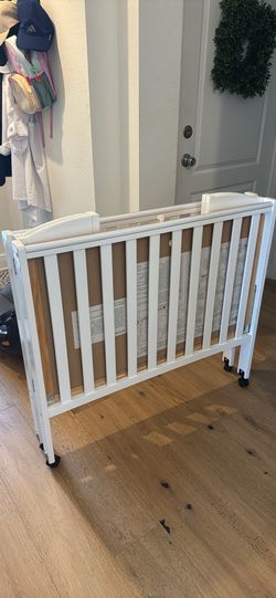 Dream On Me Portable Crib + 2 Mattresses – $100