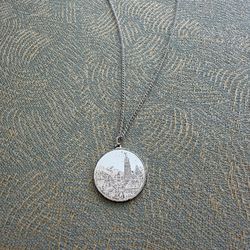 Vintage Vienna coin necklace pendant silver tone chain is approx 18” In good condition