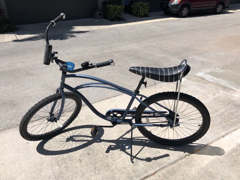 Beach cruiser with banana seat and black rims