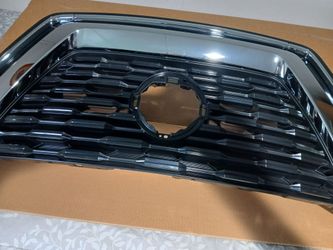Parrilla para Nissan. Roge. 2022 nueba nunca usada en su emboltura original de fabrica