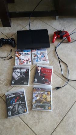PS3 W/ remotes and six games