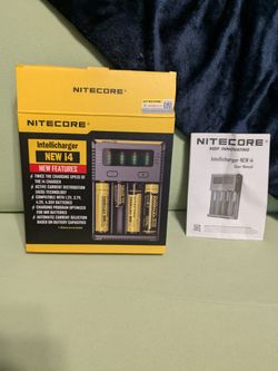 Nitecore Intellicharger NEW i4 4-Bay Battery Charger with 36 Rechargeable Batteries, Like New
