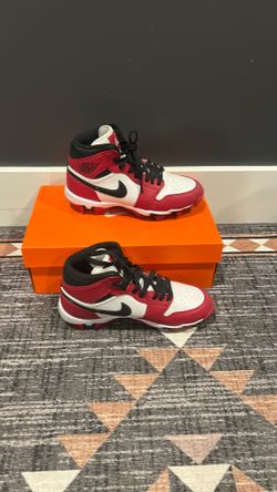 Red and white air Jordan footbal cleats size 5.5y