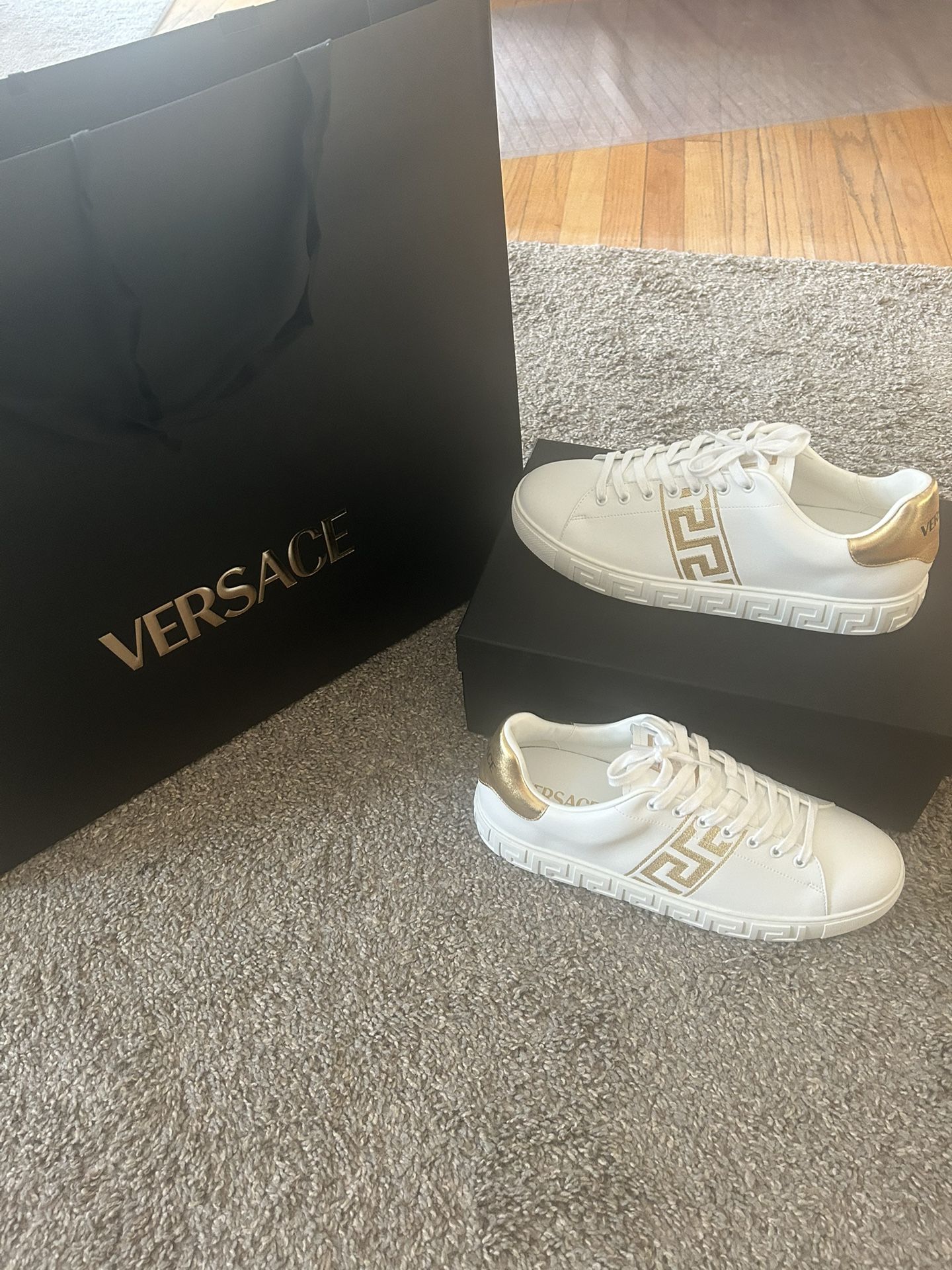 White and gold Versace greca