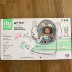 NEW baby swing