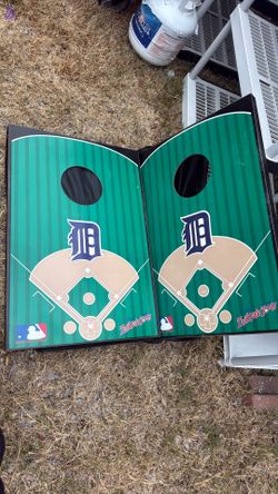 Wooden tailgate toss game