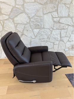 Reclining swivel leather chair