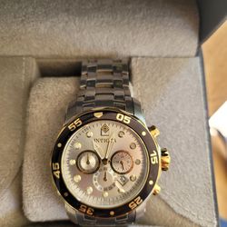 Men's invicta watches a hundred dollars apiece