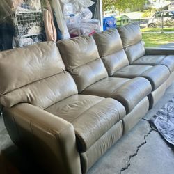Leather Sofa And Matching Swivel Chair 