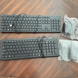 Two Sets Of Keyboard And Mouse
