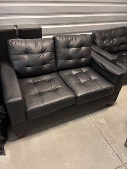 Black leather couches