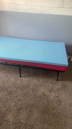 Portable folding bed