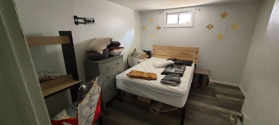 Full Size bed frame with solid wood bedhead, mattress and cover