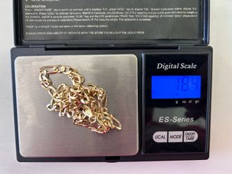 14 kt figaro chain, 21 inches long, 18.4 grams