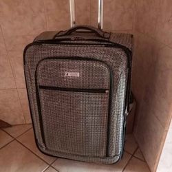 London Fog 27" Luggage.  **Wheel Base Cracked but Rolls Fine**