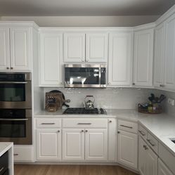 Entire kitchen upper cabinets and appliances