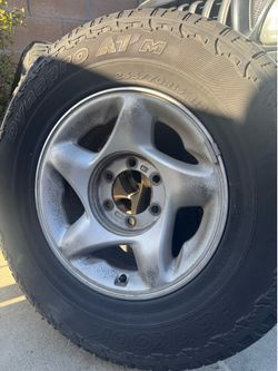 First Gen Tacoma OEM wheels + Hancook 265/70R16 Tires