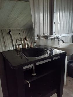 Sinks, Mirror and light fixture.
