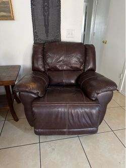 Dark brown recliner chair from Ashley