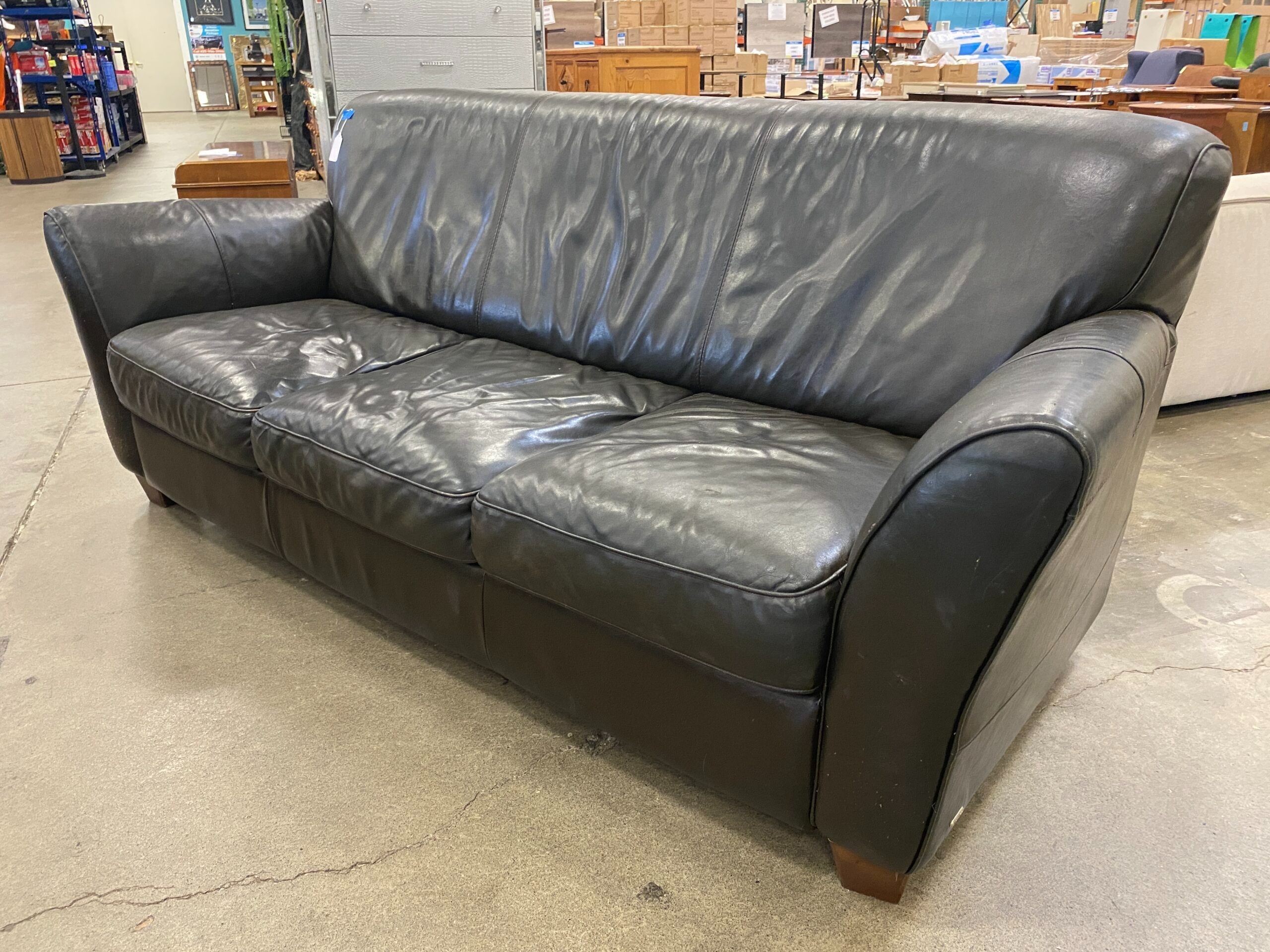 Black Leather Curved Back Sofa