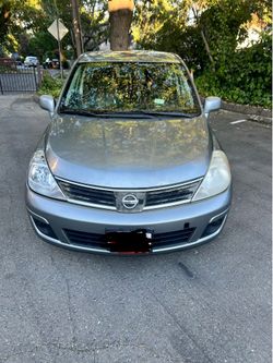 Gray Nissan Versa