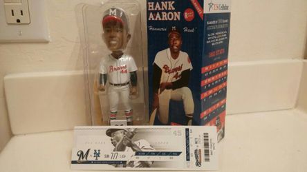 Hammerin Hank Aaron with commemorative game ticket