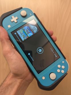 Nintendo Switch Lite with case and 2 games