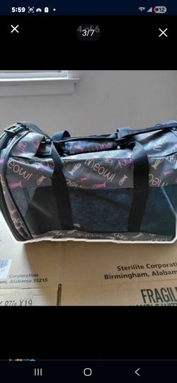 Meow meow carry bag with shoulder strap $25 no messages after 8pm