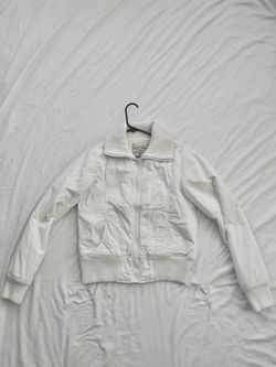 Like new condition, ladies (Anchor-Blue) brand white winter jacket. Size medium.