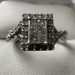 Sterling Silver ~1/4CTW Diamond Invisible Set Center Ring Size 7