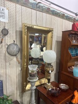 Large golden framed mirror, good condition!  Lamp right on front is for sale as well